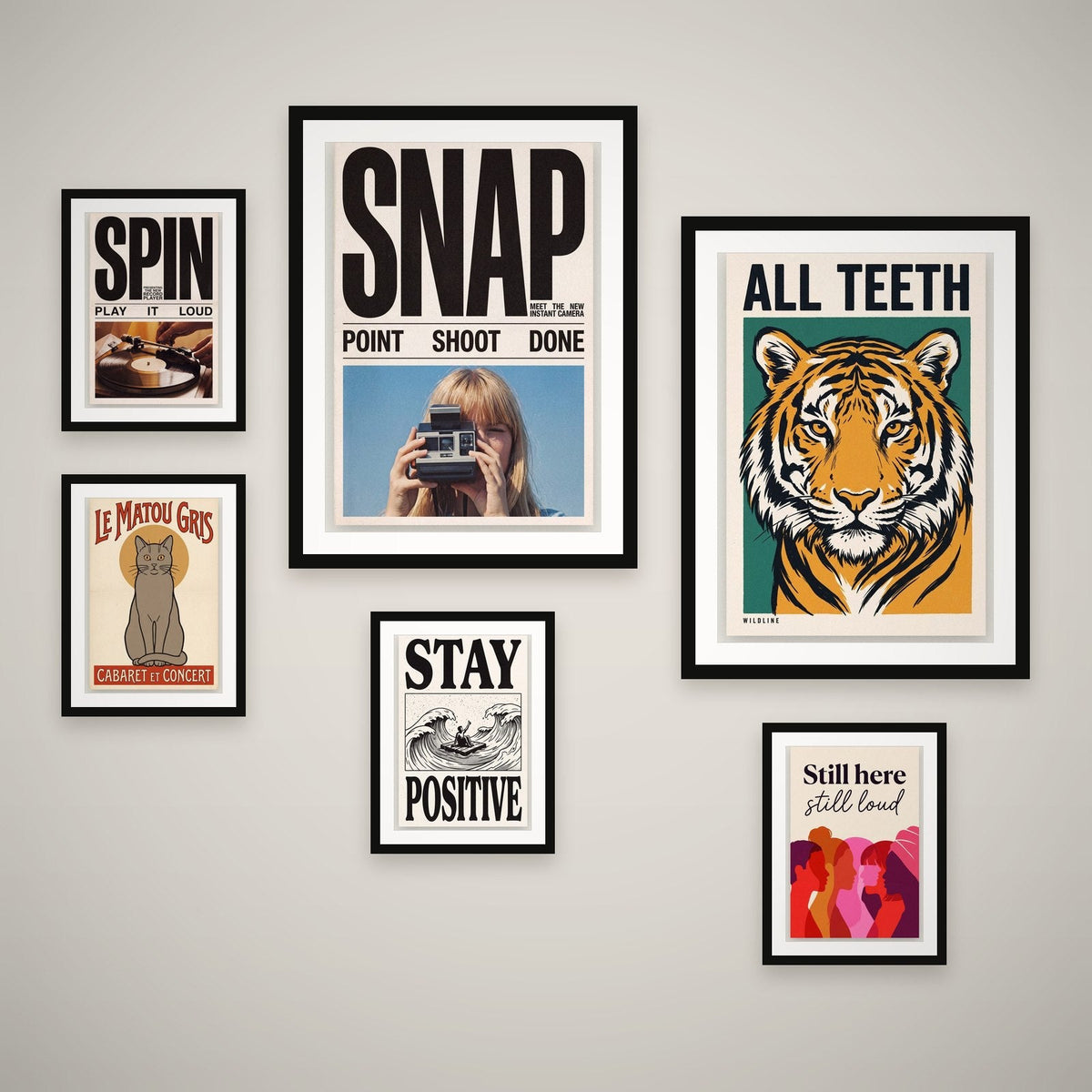 Full Volume feature wall — 6 framed prints hung as a gallery wall