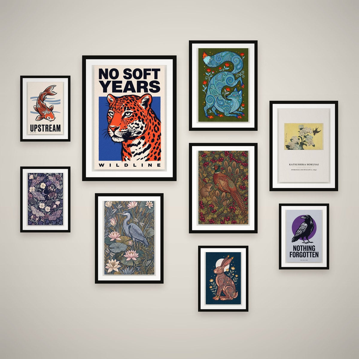 Wild Things feature wall — 9 framed prints hung as a gallery wall