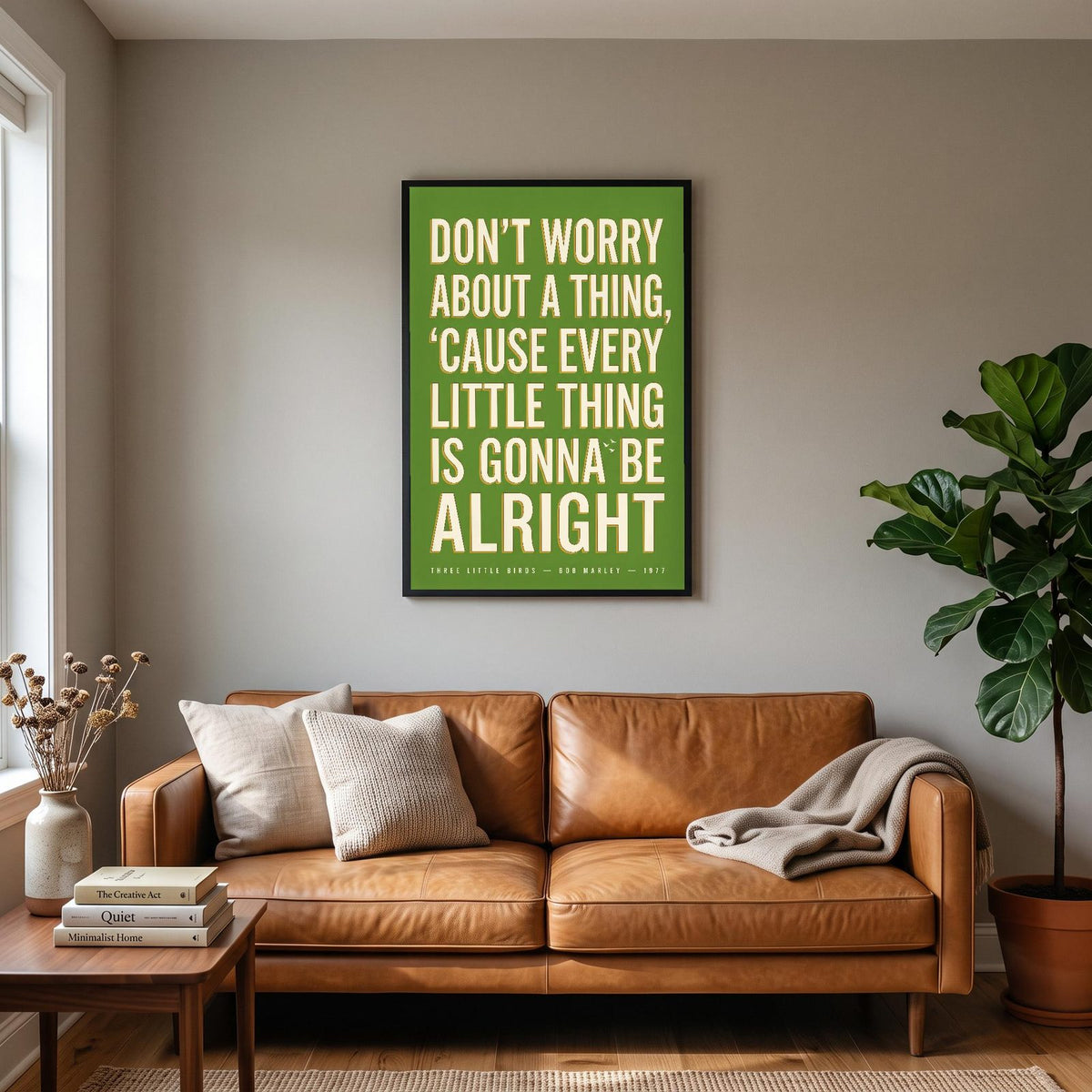 Three Little Birds Lyrics Print hanging on a living room wall
