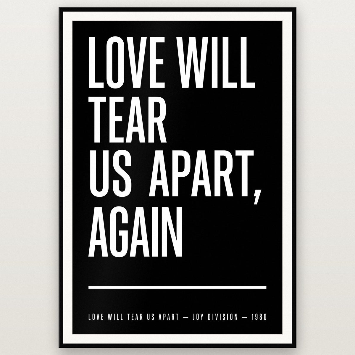 Love Will Tear Us Apart Lyrics Print shown in a black frame