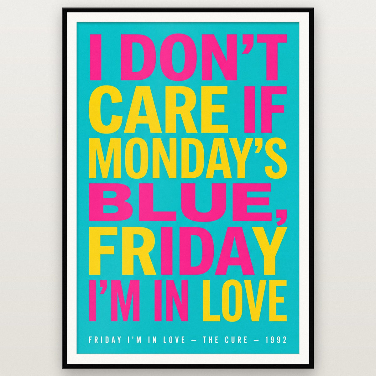Friday I'm In Love Lyrics Print shown in a black frame