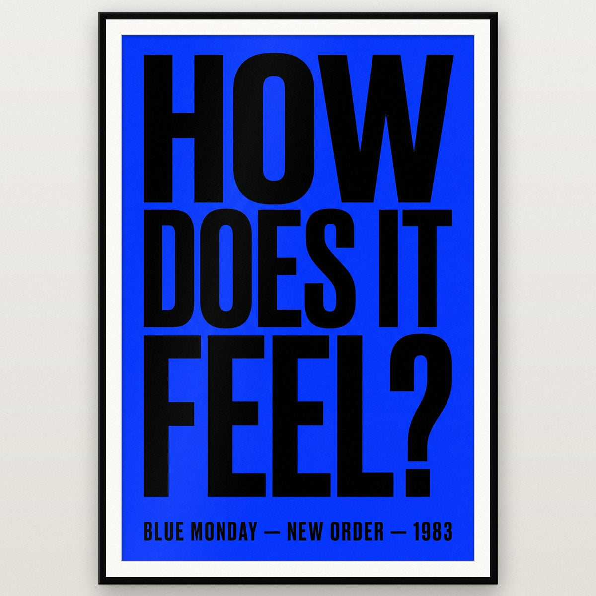 Blue Monday Lyrics Print shown in a black frame