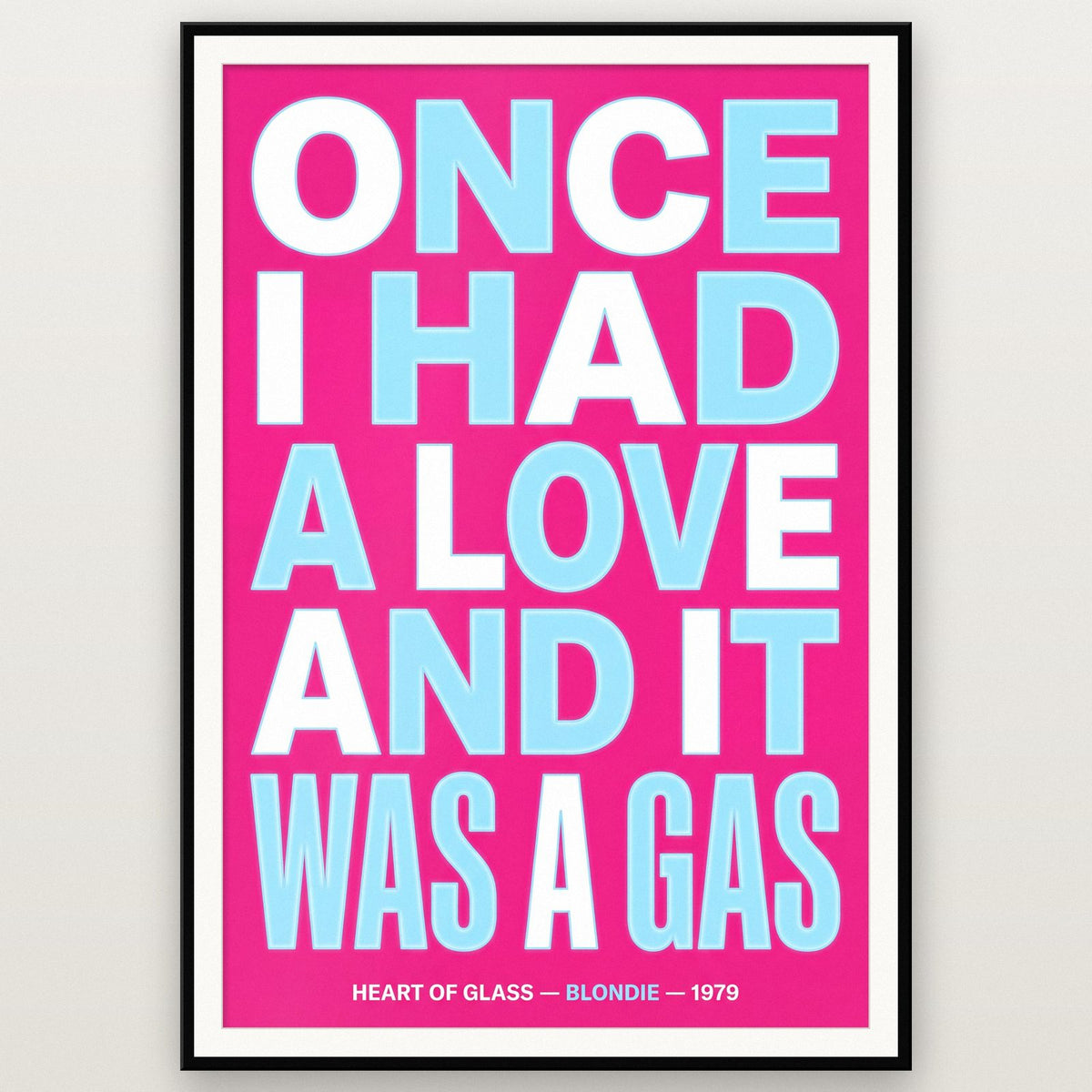 Heart Of Glass Lyrics Print shown in a black frame