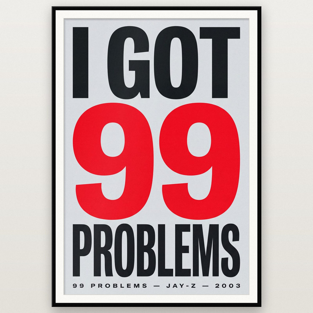 99 Problems Lyrics Print shown in a black frame