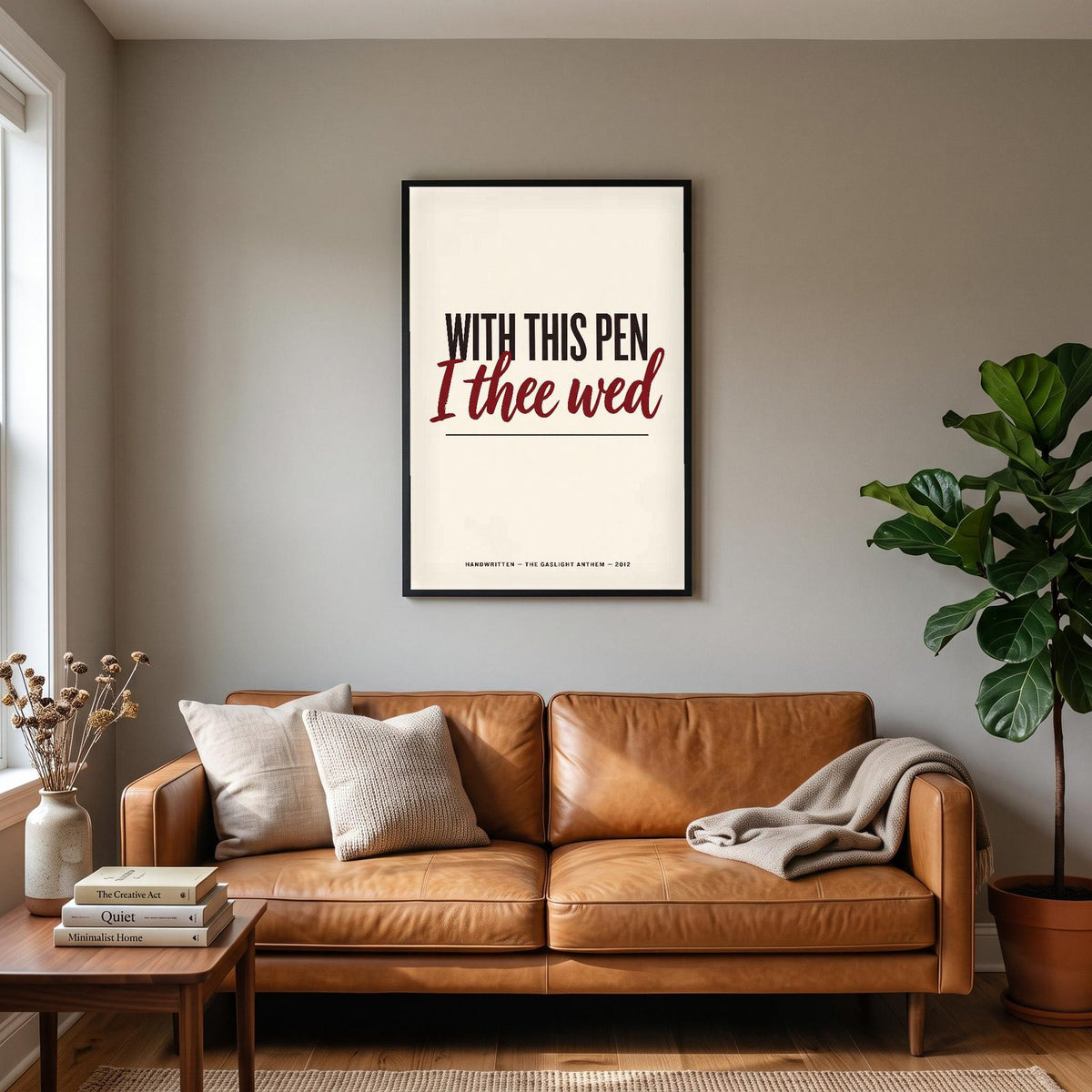 Handwritten Lyrics Print hanging on a living room wall