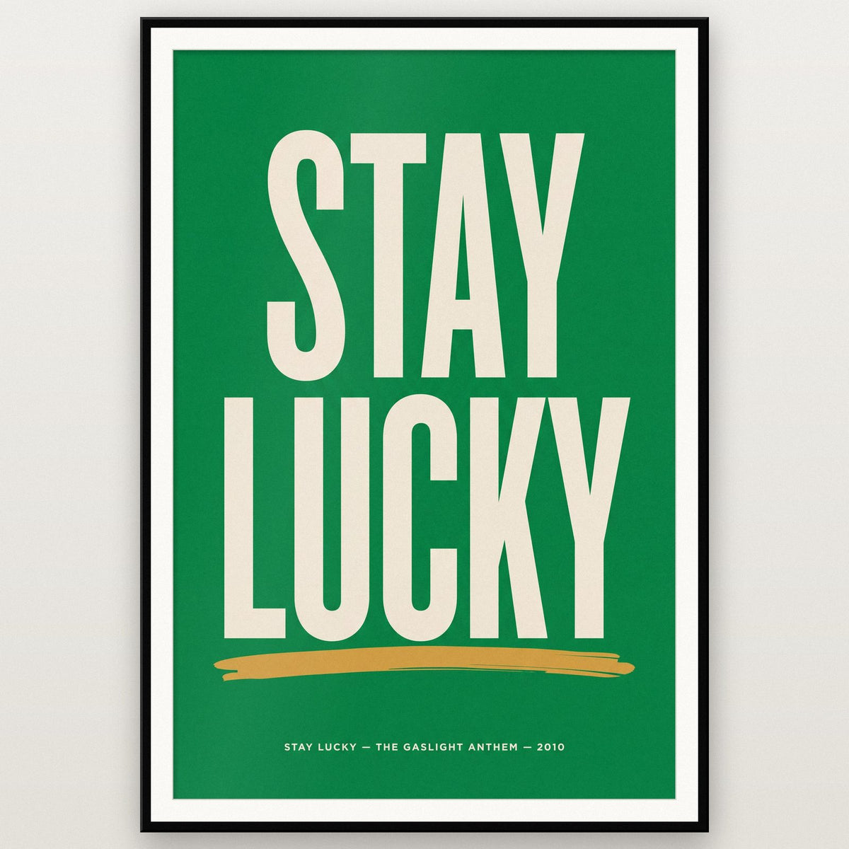Stay Lucky Lyrics Print shown in a black frame