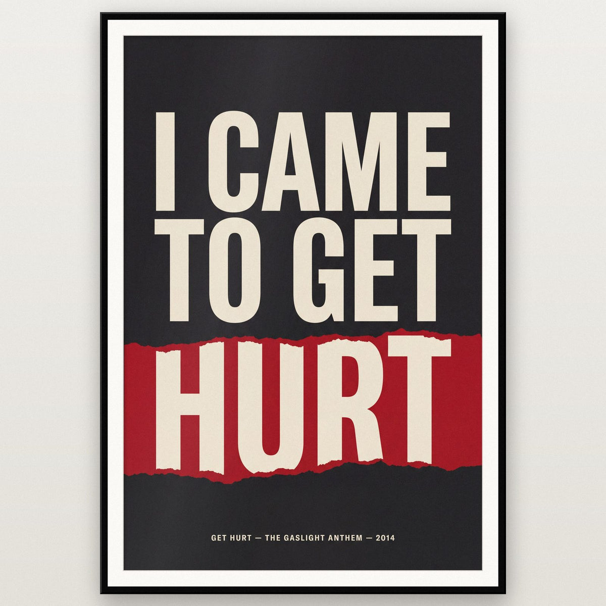 Get Hurt Lyrics Print shown in a black frame