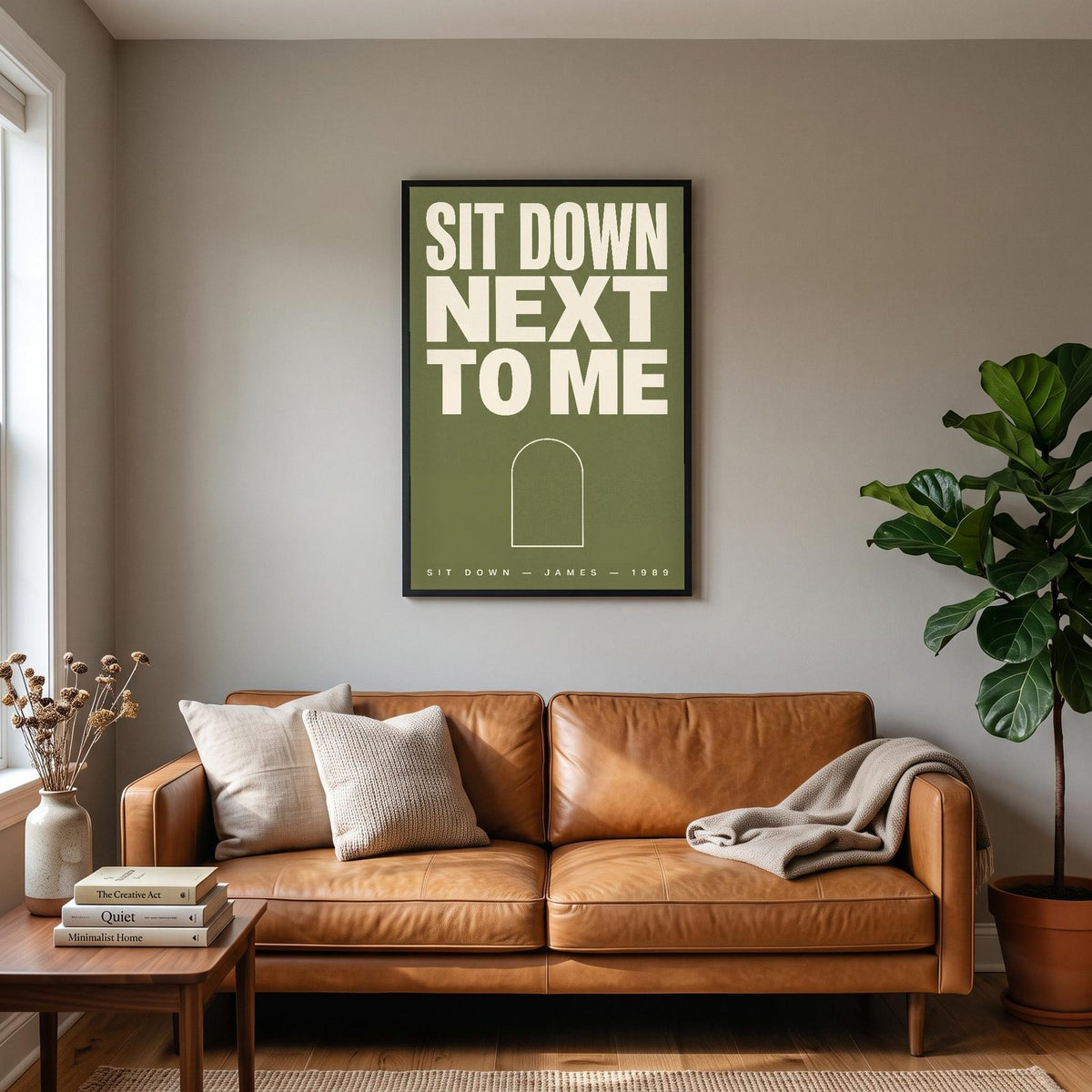 Sit Down Lyrics Print hanging on a living room wall