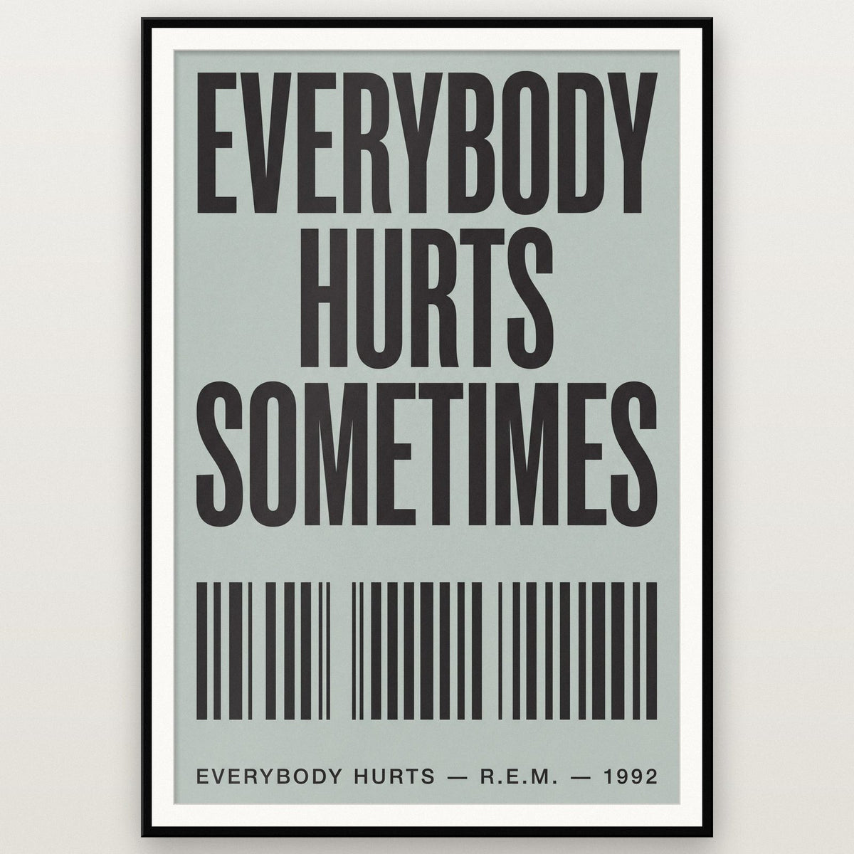 Everybody Hurts Lyrics Print shown in a black frame