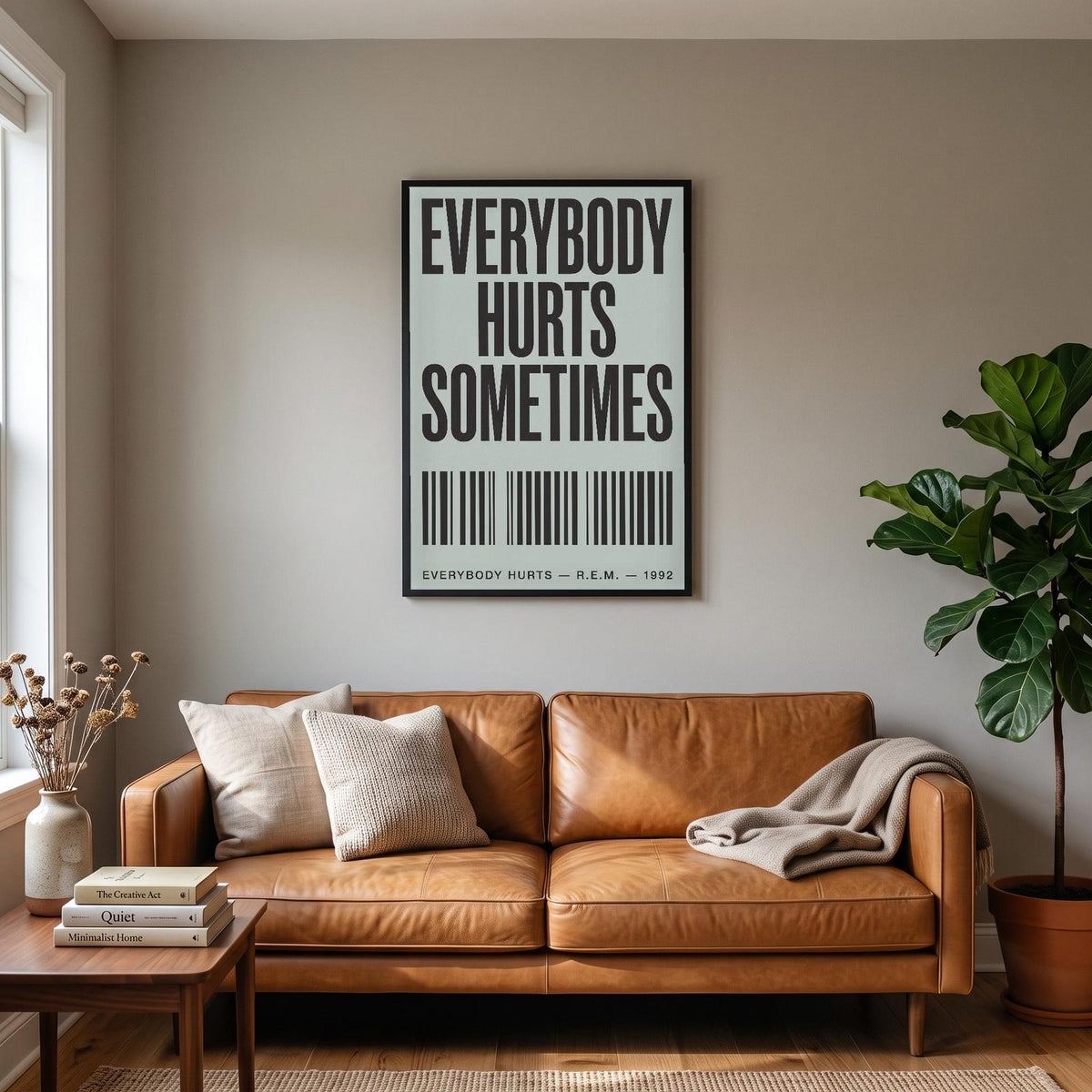 Everybody Hurts Lyrics Print hanging on a living room wall