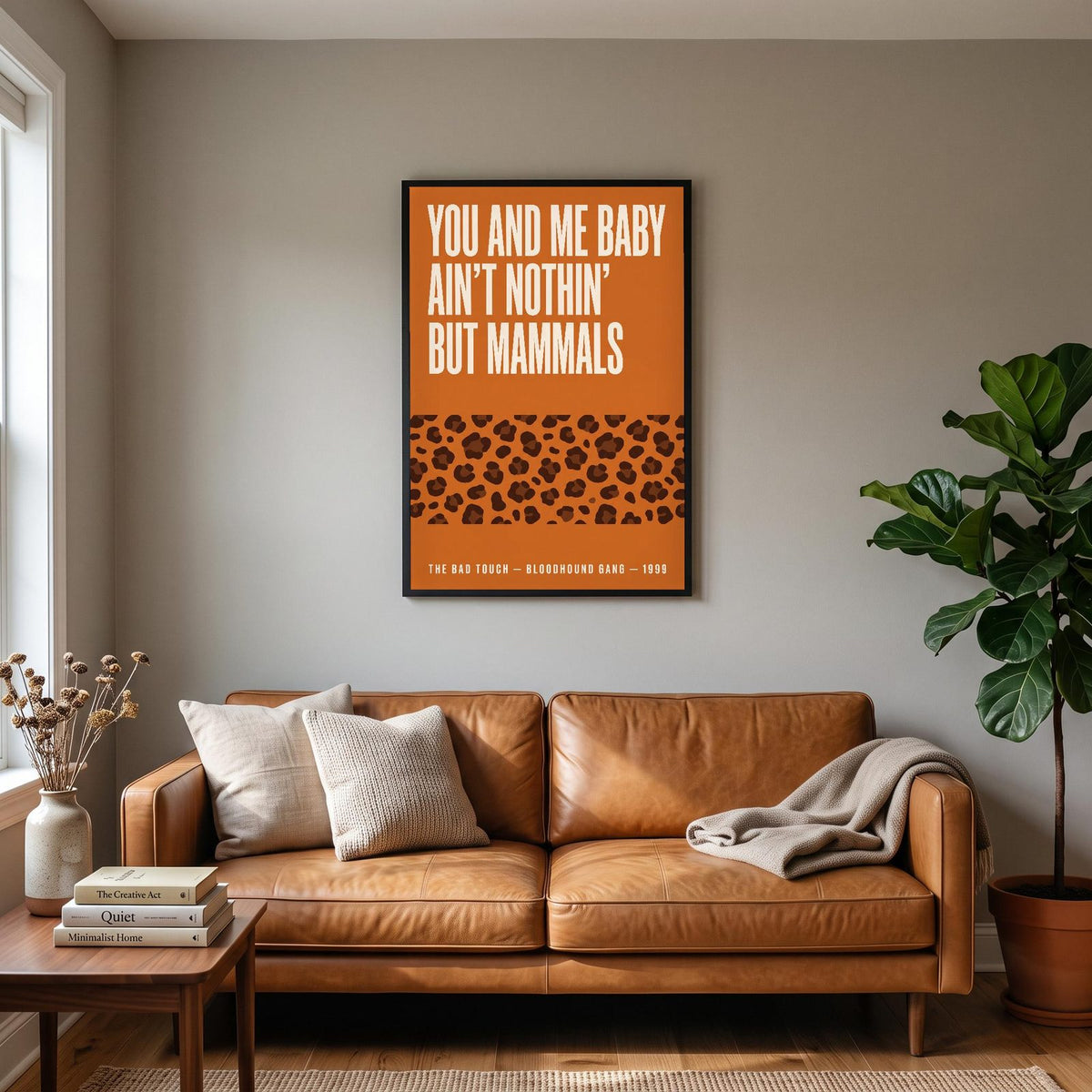 The Bad Touch Lyrics Print hanging on a living room wall
