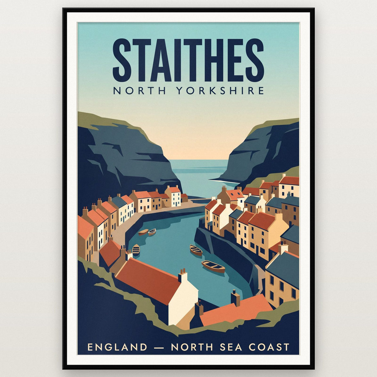 Staithes Print shown in a black frame