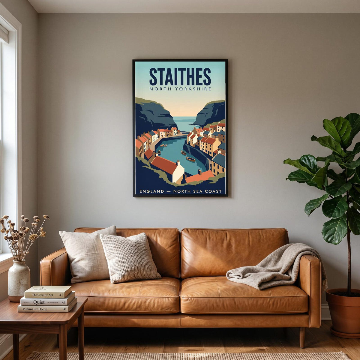 Staithes Print hanging on a living room wall