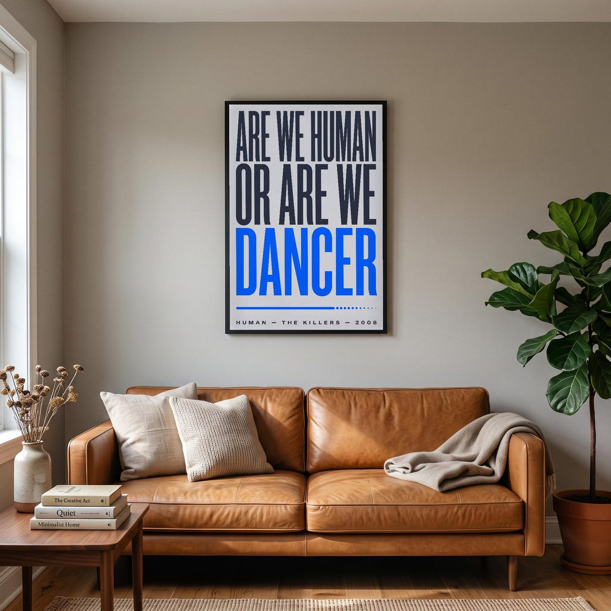Human Lyrics Print hanging on a living room wall