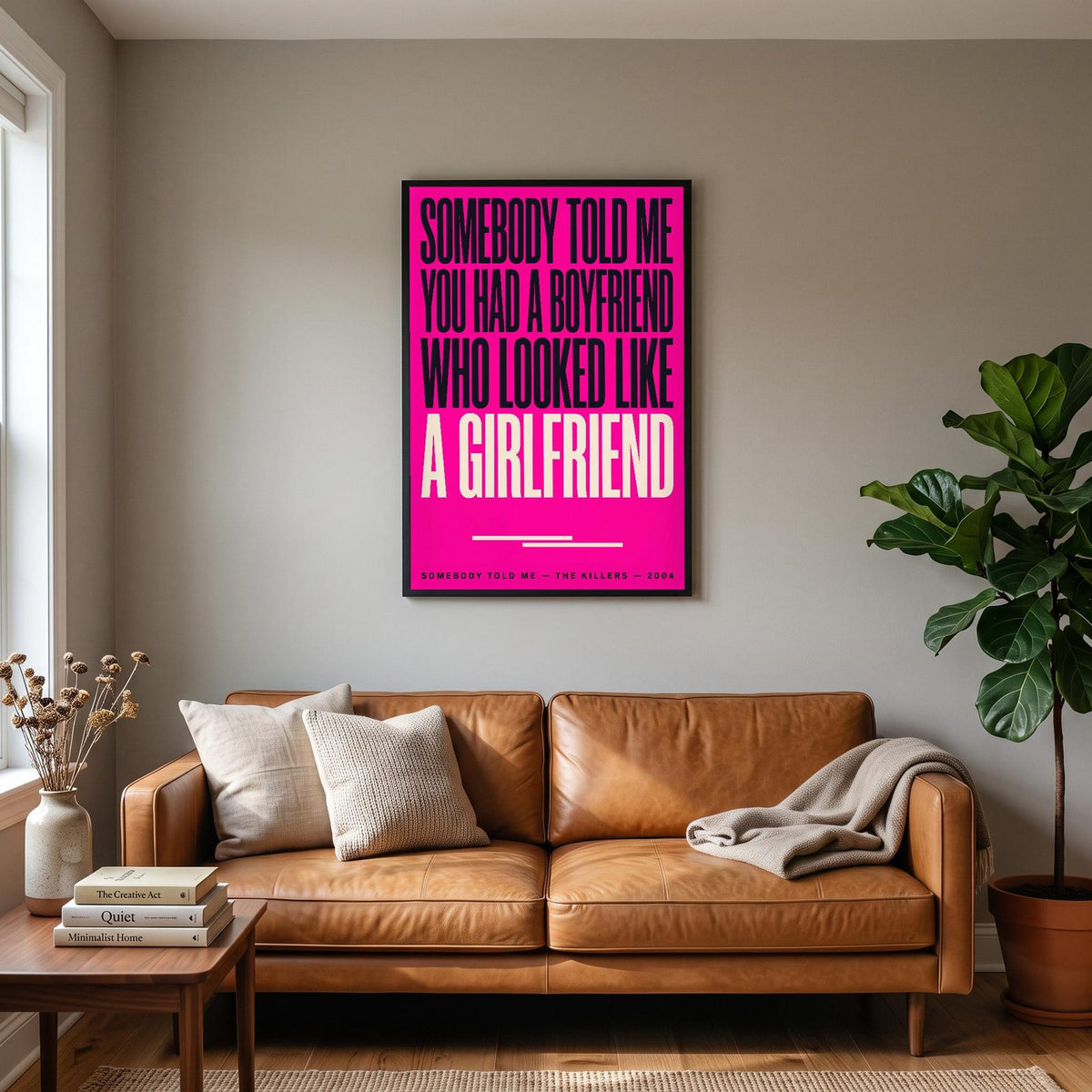 Somebody Told Me Print hanging on a living room wall