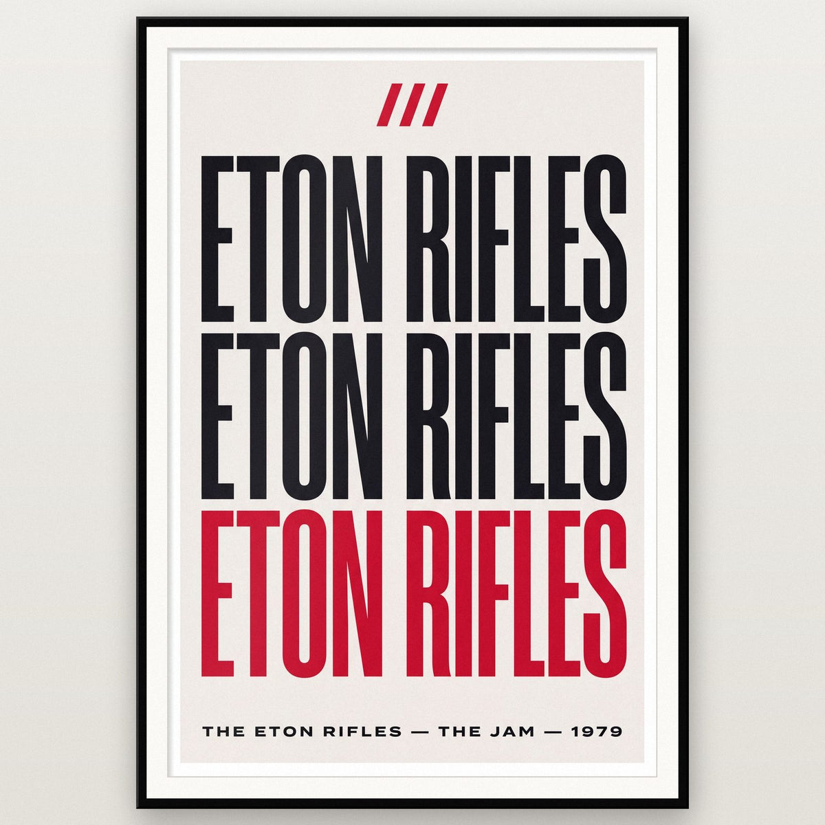 The Eton Rifles Lyrics Print shown in a black frame