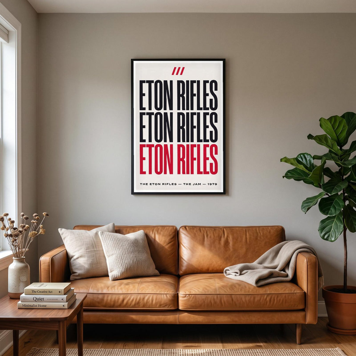 The Eton Rifles Lyrics Print hanging on a living room wall
