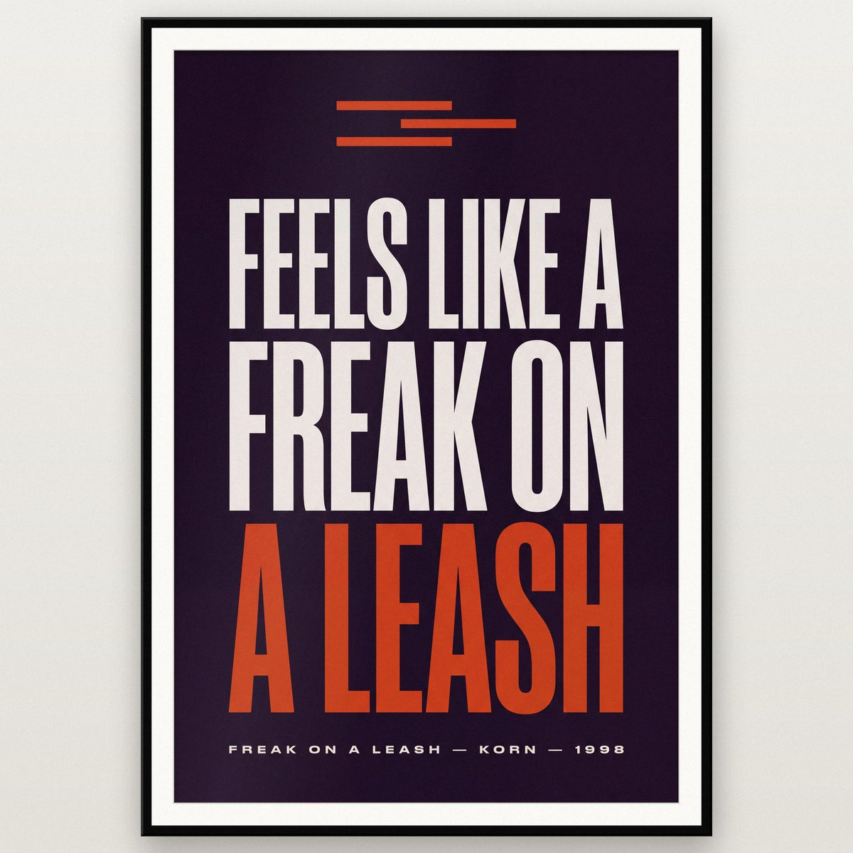 Freak On A Leash Lyrics Print shown in a black frame