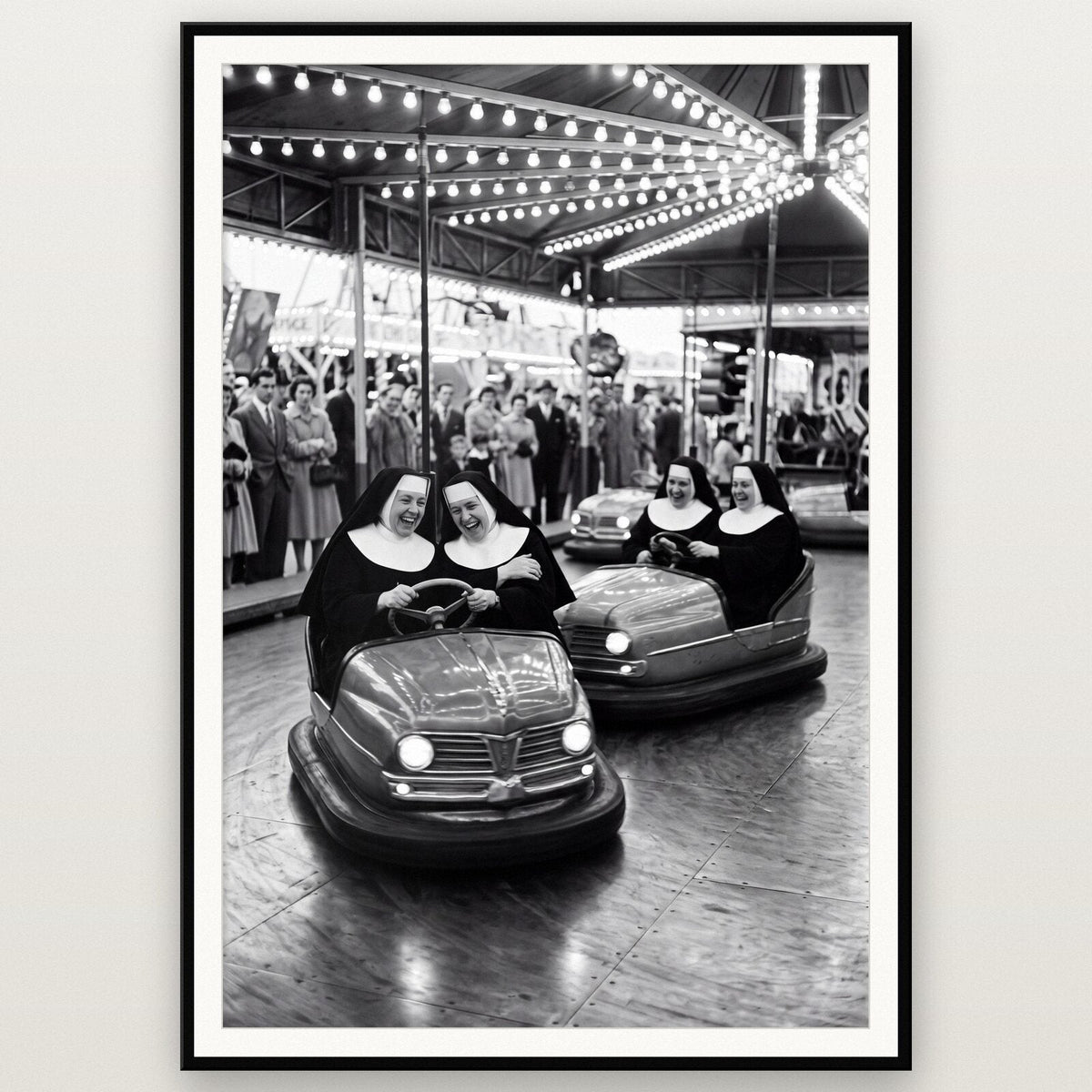 Nuns On The Dodgems shown framed on a wall