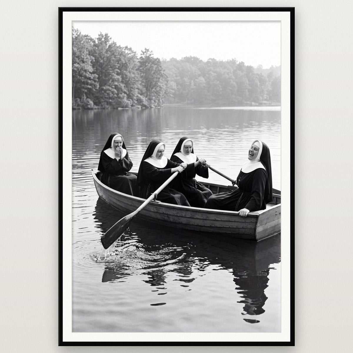 Nuns In A Rowing Boat shown framed on a wall