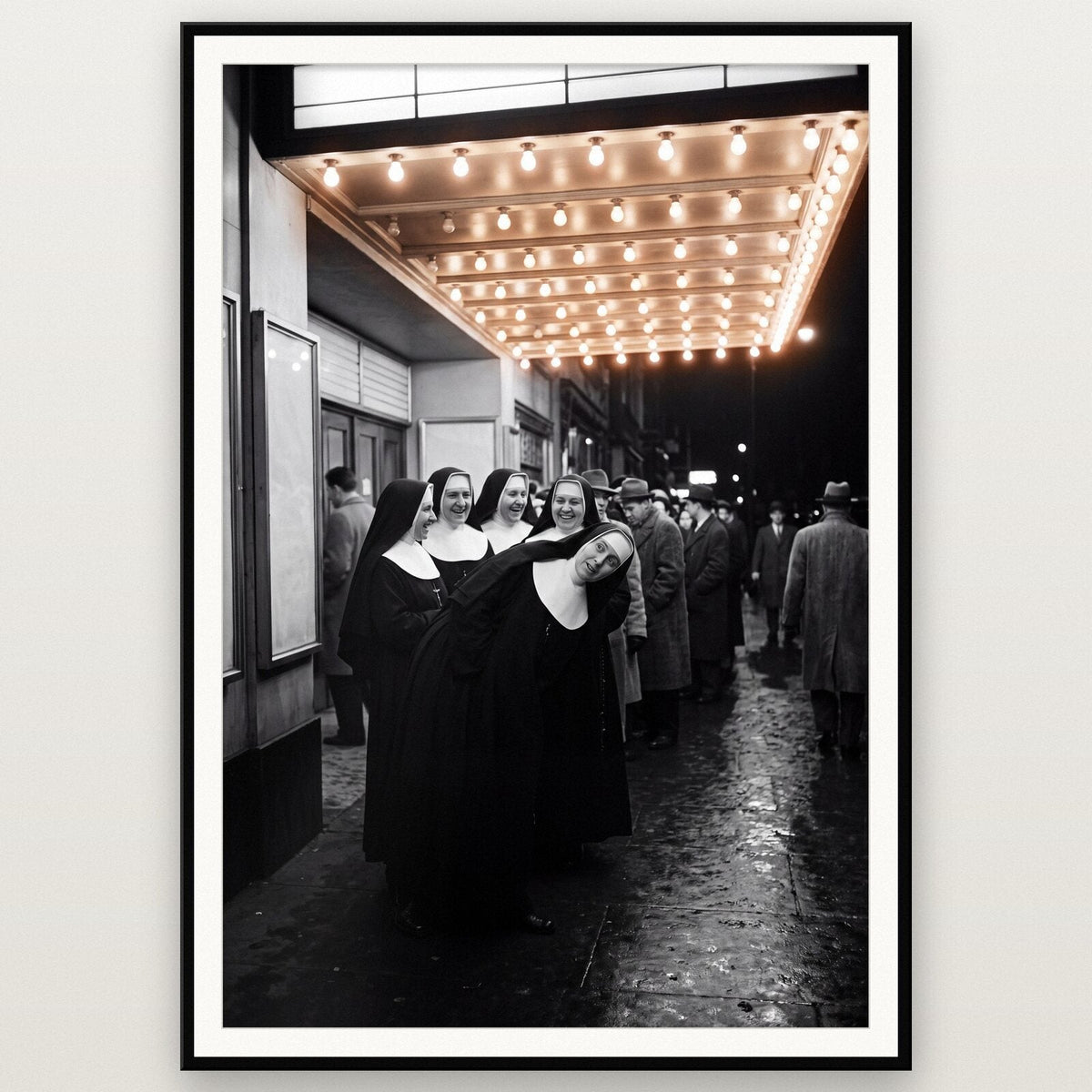 Nuns At The Pictures shown framed on a wall