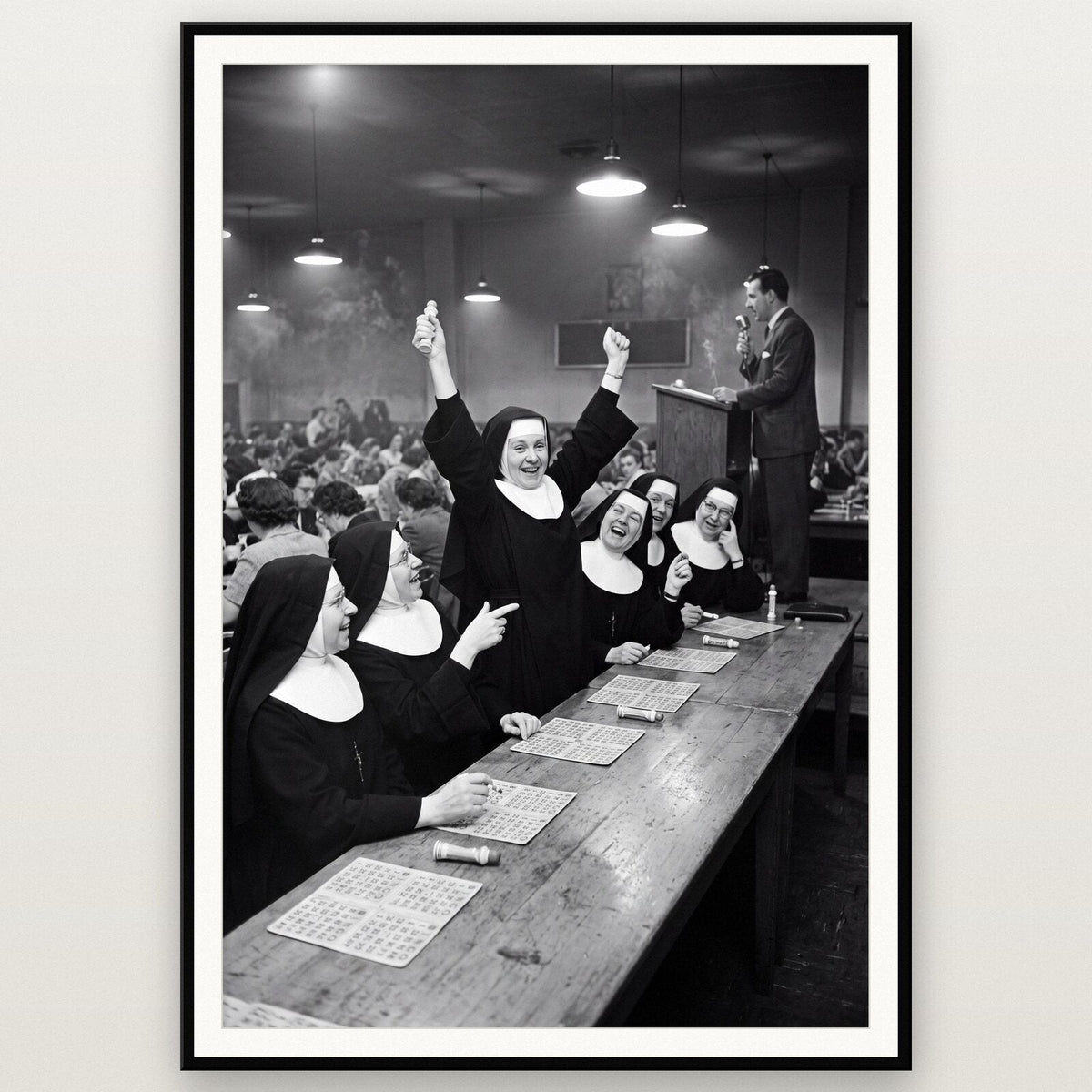 Nuns At The Bingo shown framed on a wall